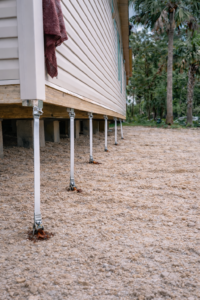 Mobile home after tie downs are installed providing secure anchoring and storm protection.