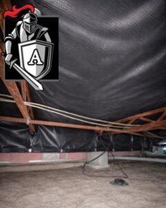 Professionally repaired vapor barrier installed under a mobile home, protecting floor framing from moisture, mold, and ground humidity.