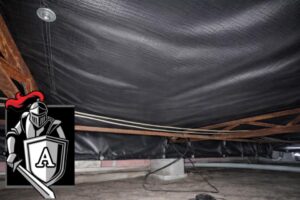 Professionally repaired vapor barrier installed under a mobile home, protecting floor framing from moisture, mold, and ground humidity.